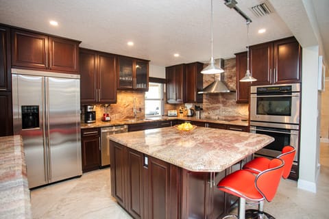 Over-sized Designer Kitchen + Marble & Granite + High End Appliances