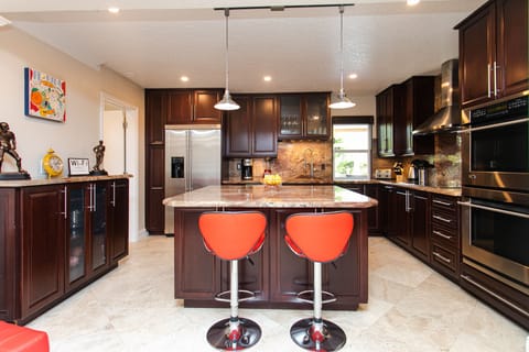 Over-sized Designer Kitchen + Marble & Granite + High End Appliances