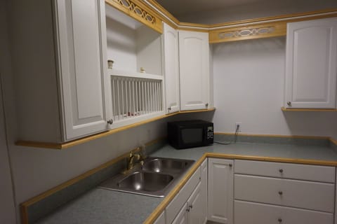 Wet bar/3rd kitchen w/4th refrigerator.  Great for making popcorn & refreshments