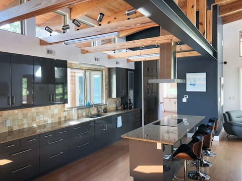 Kitchen with countertop breakfast area