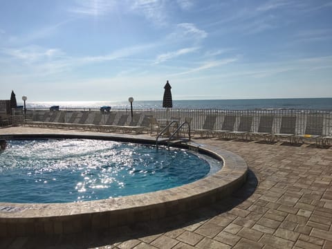Beachside pool at Sand Castle 3 - perfect for relaxing on your vacation!