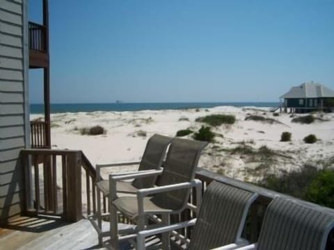 View looking west from the deck to the beach...see boardwalk below.