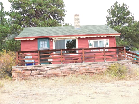 Large south-facing front porch with gas barbecue