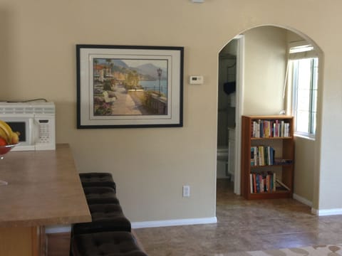 View from kitchen going to bathroom.