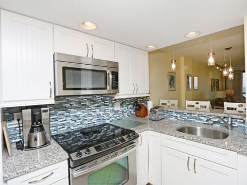 Full-sized coffee maker, blender, air popper, crock pot...fully stocked kitchen