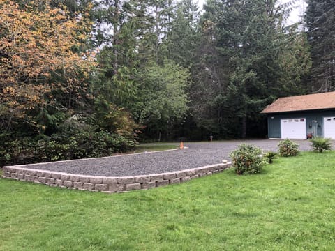 Large level pad for RV or trailer w/ power/water avail. for extra fee per night.