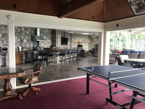 Pavilion game room with ping pong table