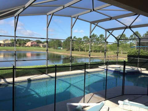 View of the pool. There is a safety fence that is removable.