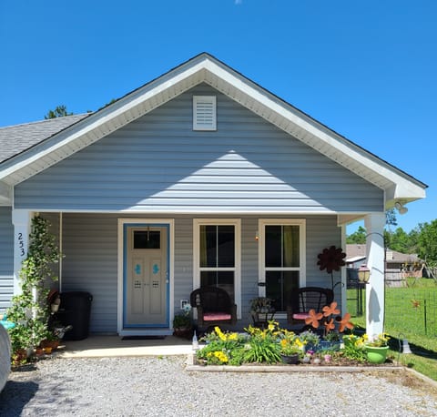 Front door is your entrance you get one side of driveway 