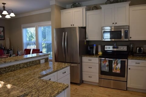 A well stocked kitchen for the family that wants to cook in or order take out.