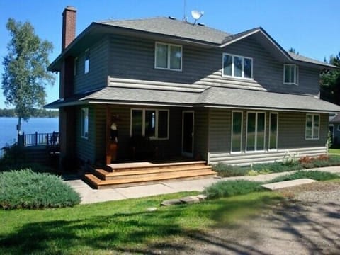 Photo of the back of the home when you drive into driveway