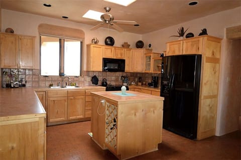 Kitchen is equipped with everything you might need.