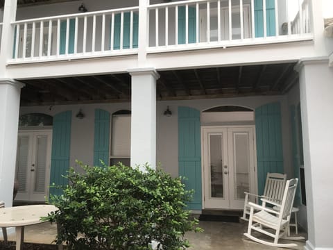 Large porch area with gas BBQ, storage bench with sand toys, wagons for beach