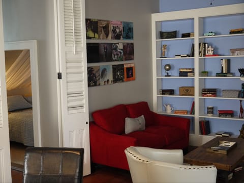 LIVING ROOM WITH A VIEW OF BEDROOM