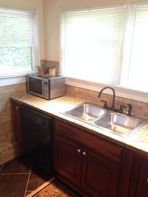 The fully equipped kitchen is completely updated with granite counter tops.