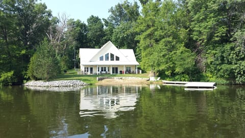 View of house from lake
Beach and boat dock 