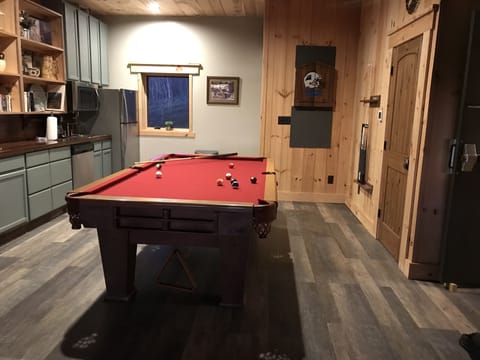 Downstairs game room with kitchenette 