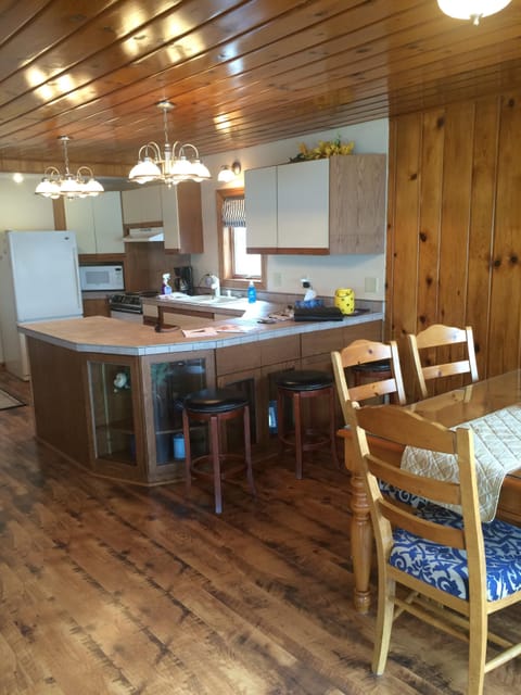 kitchen with dishwasher, stove/oven, and refrigerator
