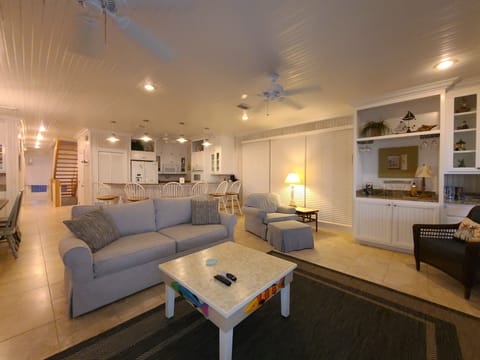 2nd Story living area with kitchen and dining area 