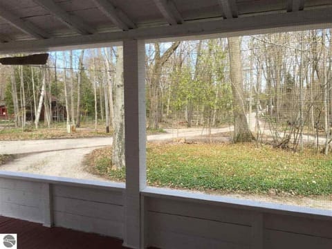 Front Porch:  One block this way to Crystal Lake beach & M22 vacation corridor.