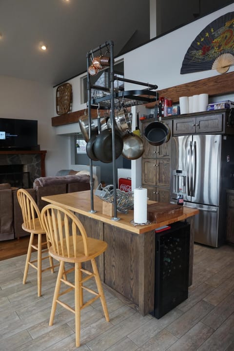Kitchen, with wine refrigerator, basic condiments & spices provided. 