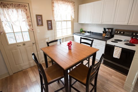 Kitchen and back door to deck.  Table seats 4