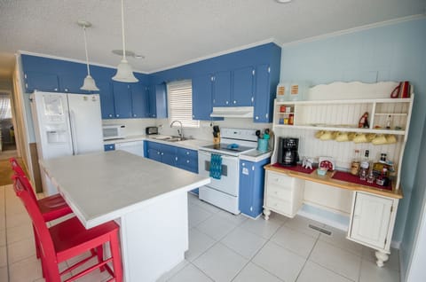 Kitchen with large island and extra storage