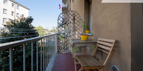 Balcony outside the kitchen, with table and chairs