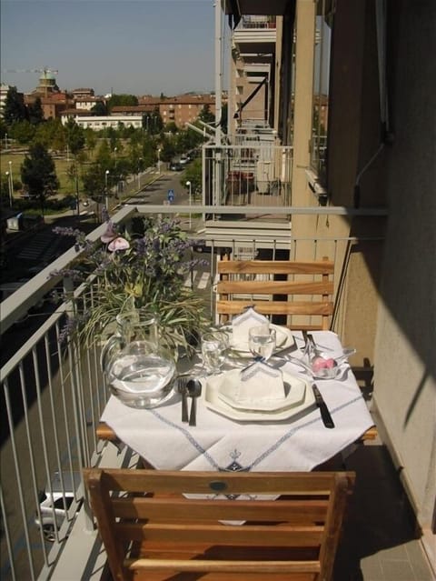 Balcony with view on the park and on the parking places