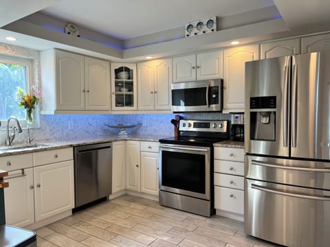 Enjoy our fully stocked kitchen with all the amenities of home!