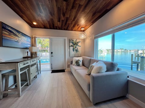 Our cabana entryway w/ queen sofabed for 2. Full bathroom with laundry as well.