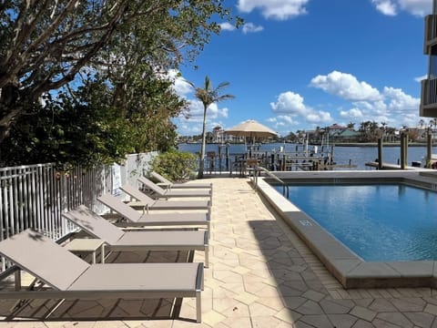 Plenty of space for lounging around the community heated pool.