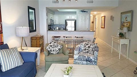 Updated living room with new light fixtures, furniture and fresh paint