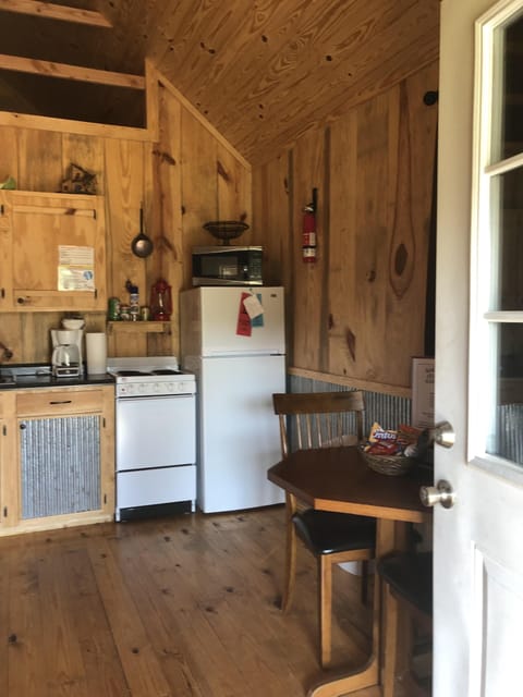 Kitchen - stocked with pots, pans, dishes, etc.