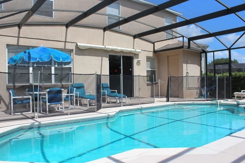 Patio and 30 ft Pool with attached spa. Slider leads to dining and kitchen area.