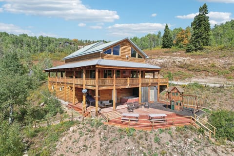 The whole mountainside is yours - lodge, decks, hot tub, and play areas