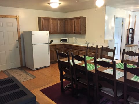 Optional Bunkhouse provides small kitchen, large table and full bathroom.