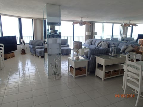 Open area consisting of dining, den, and bar. 