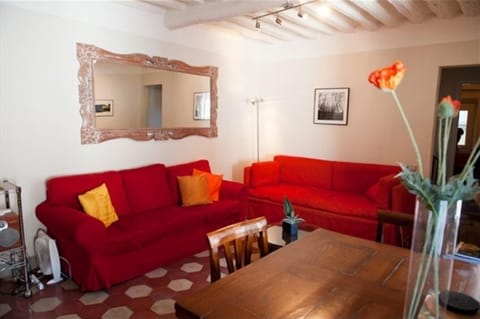 Light filled living room, comfy couches for that post lunch nap or good book!