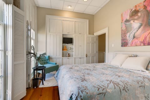 Elysian Suite Built-in Cabinetry and privacy shutters.