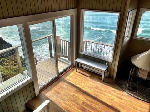 New doors and deck overlooking beach.