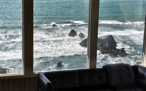 Rocks and crashing waves everywhere. 