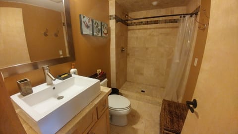 Quality fixtures and tile make for a lovely bathroom.
