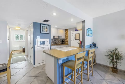 Kitchen has a dishwasher, Microwave, Fridge w/ice maker and a full size stove 