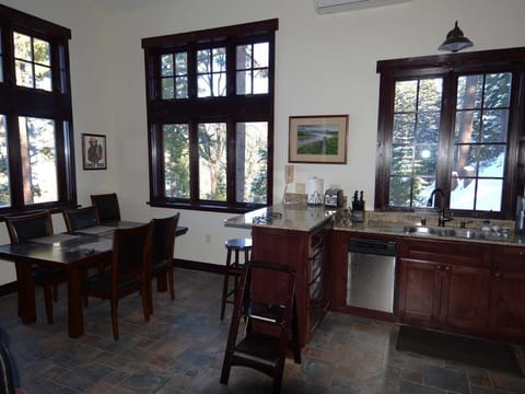 Full kitchen, dining room, breakfast bar and more views