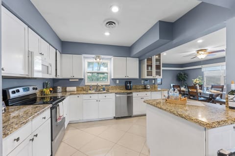 From kitchen to table --the open kitchen is just steps away from the dining room