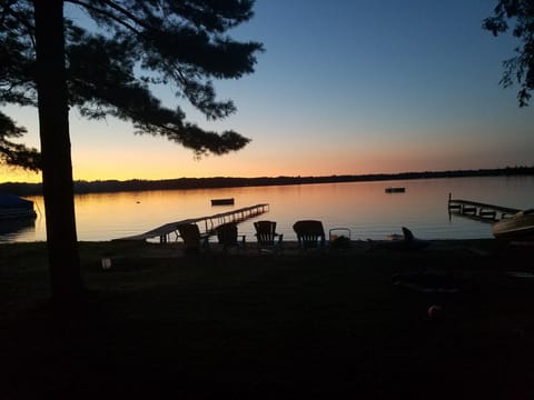 Gorgeous sunsets viewable from the family room, porch, and beach.