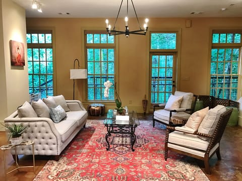Living Room with large windows overlooking the forest - 1st Floor.