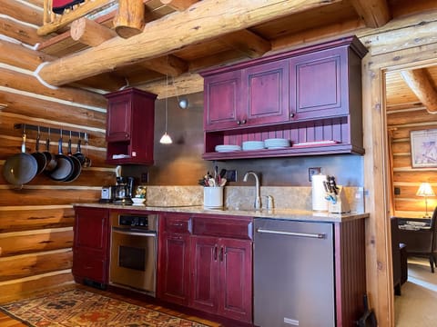 Updated kitchen with stainless steel appliances, granite countertops.