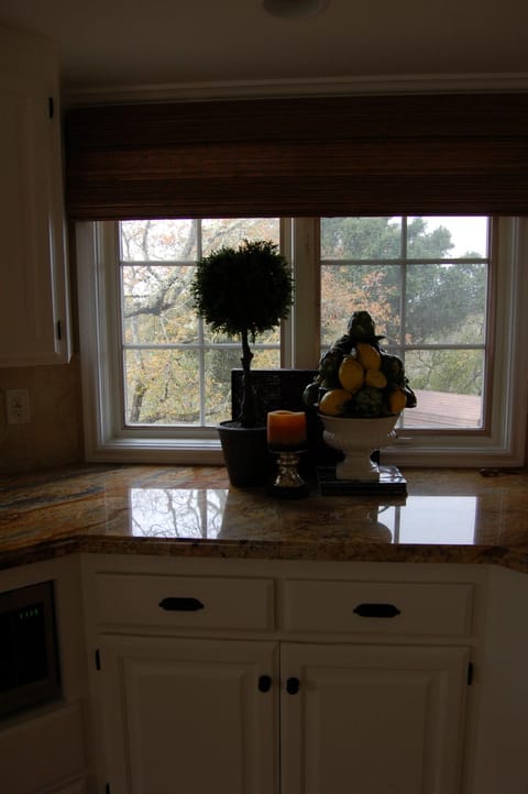 The kitchen has amazing views of the surrounding valleys and vineyards